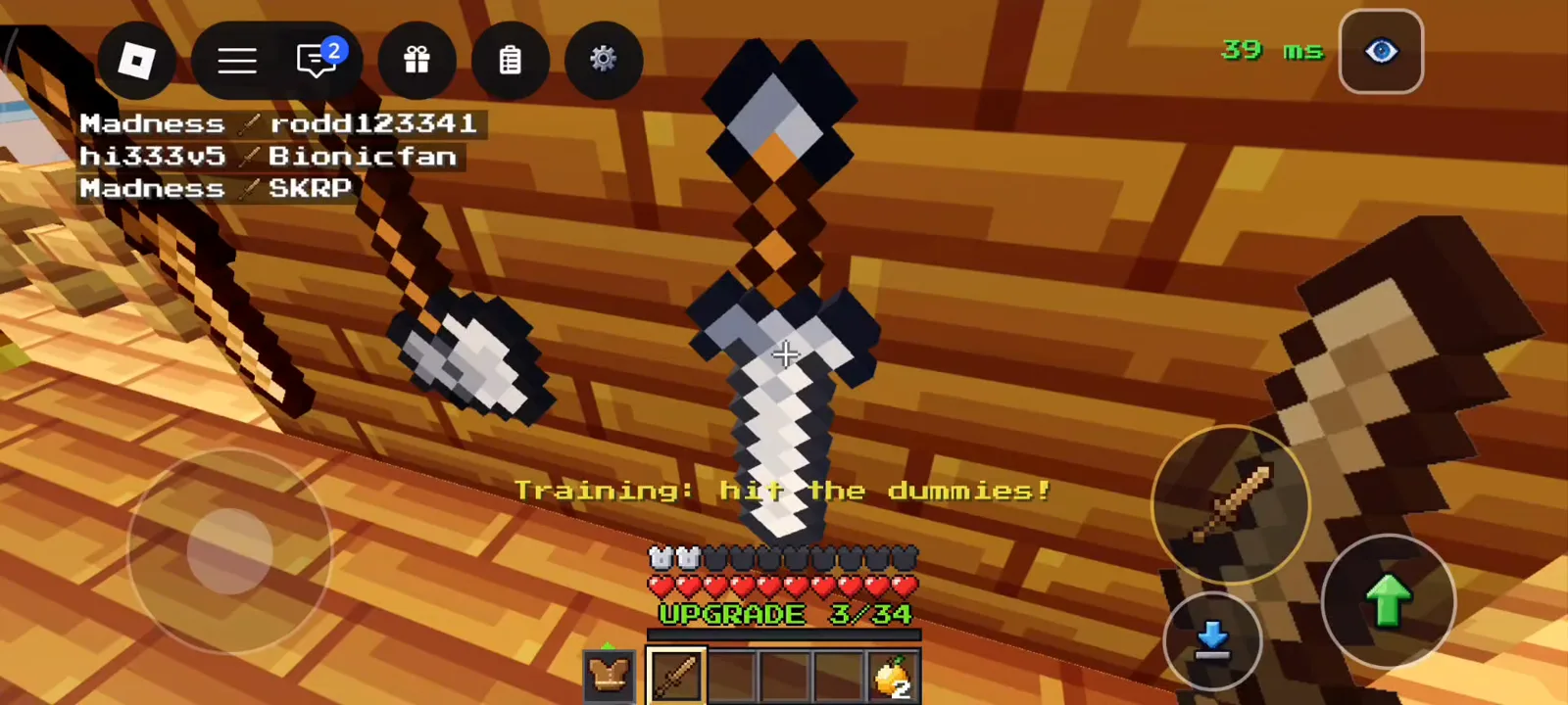 Training mode hotbar with two golden apples and iron sword dummy range